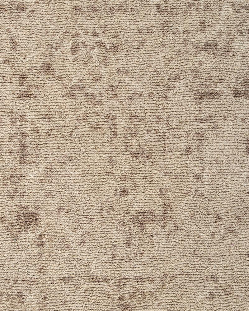 Close up of the Baya 'Cadence Camel' pure wool floor rug in brown and beige