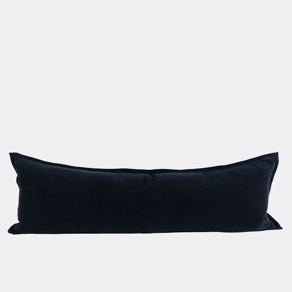 A full image of a velvet long lumbar cushion, in a classy true black shade by Eadie Lifestyle