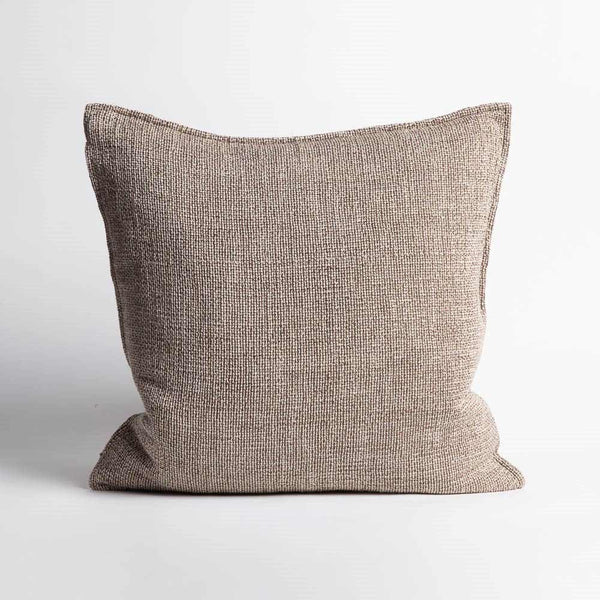 A taupe beige linen cotton cushion with hem detailing