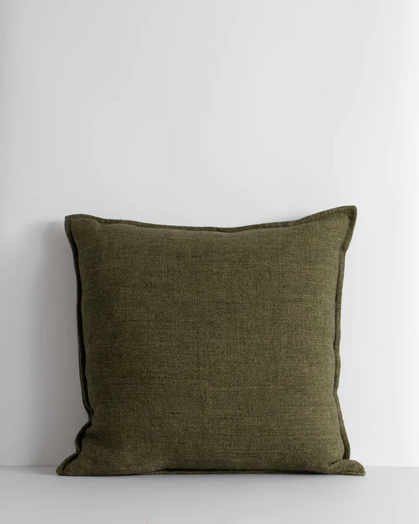 An on-trend textural linen cushion with a flange edge, in colour moss green