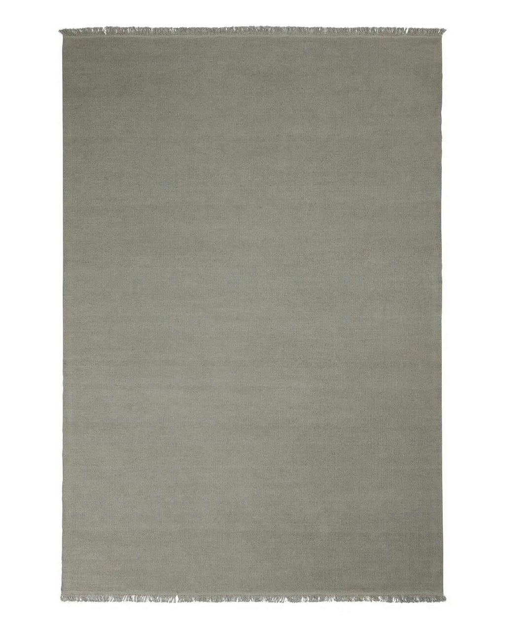 A full image of a handwoven linen floor rug in a soft grey green tone with fringe edging.