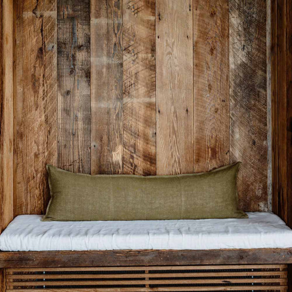 Full image of a long lumbar cushion by Eadie Lifestyle in natural linen. The cushion is a gorgeous olive-green colour.
