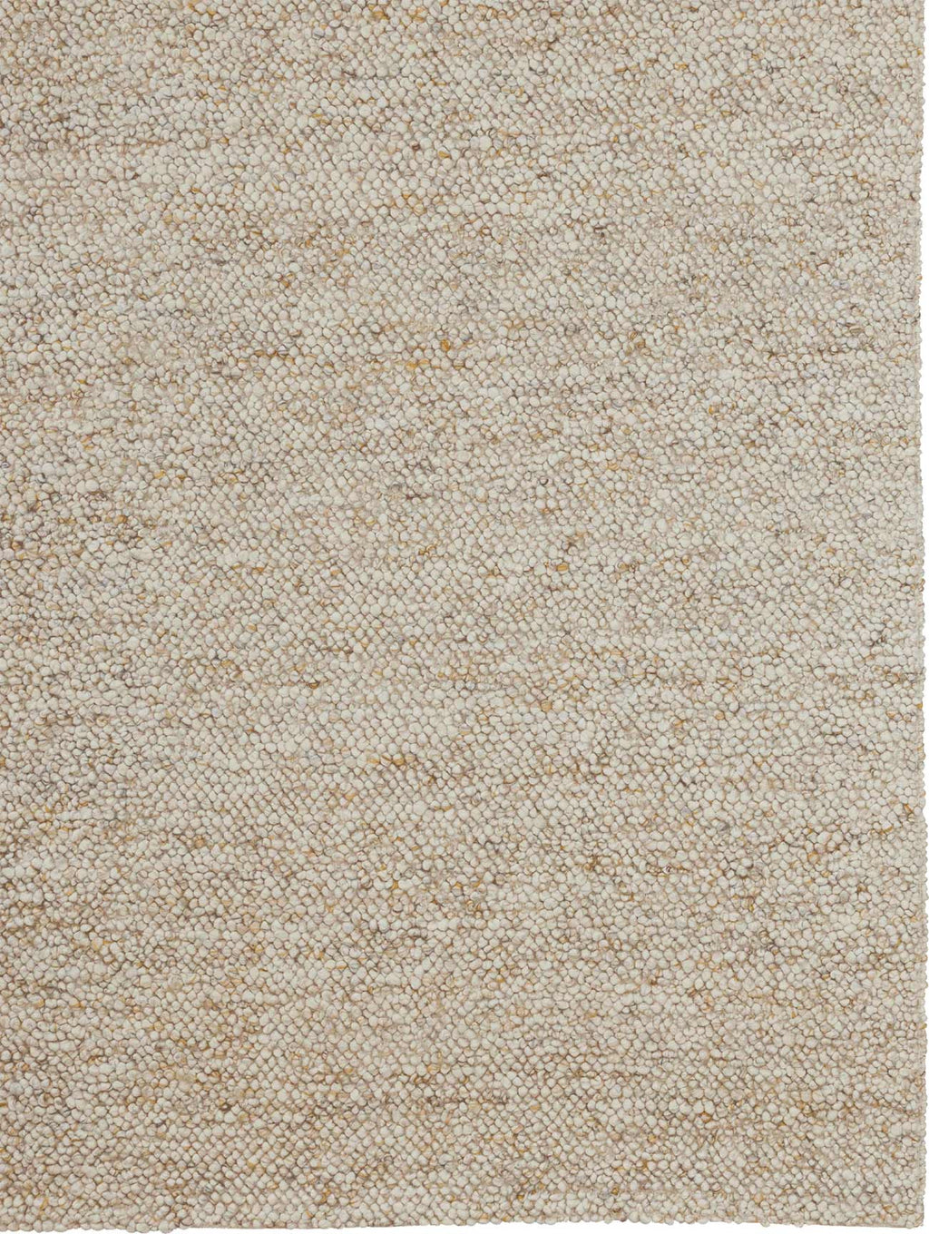 Detail from above of the Tribe Home NZ bobbly Pearle wool rug in colour Marigold