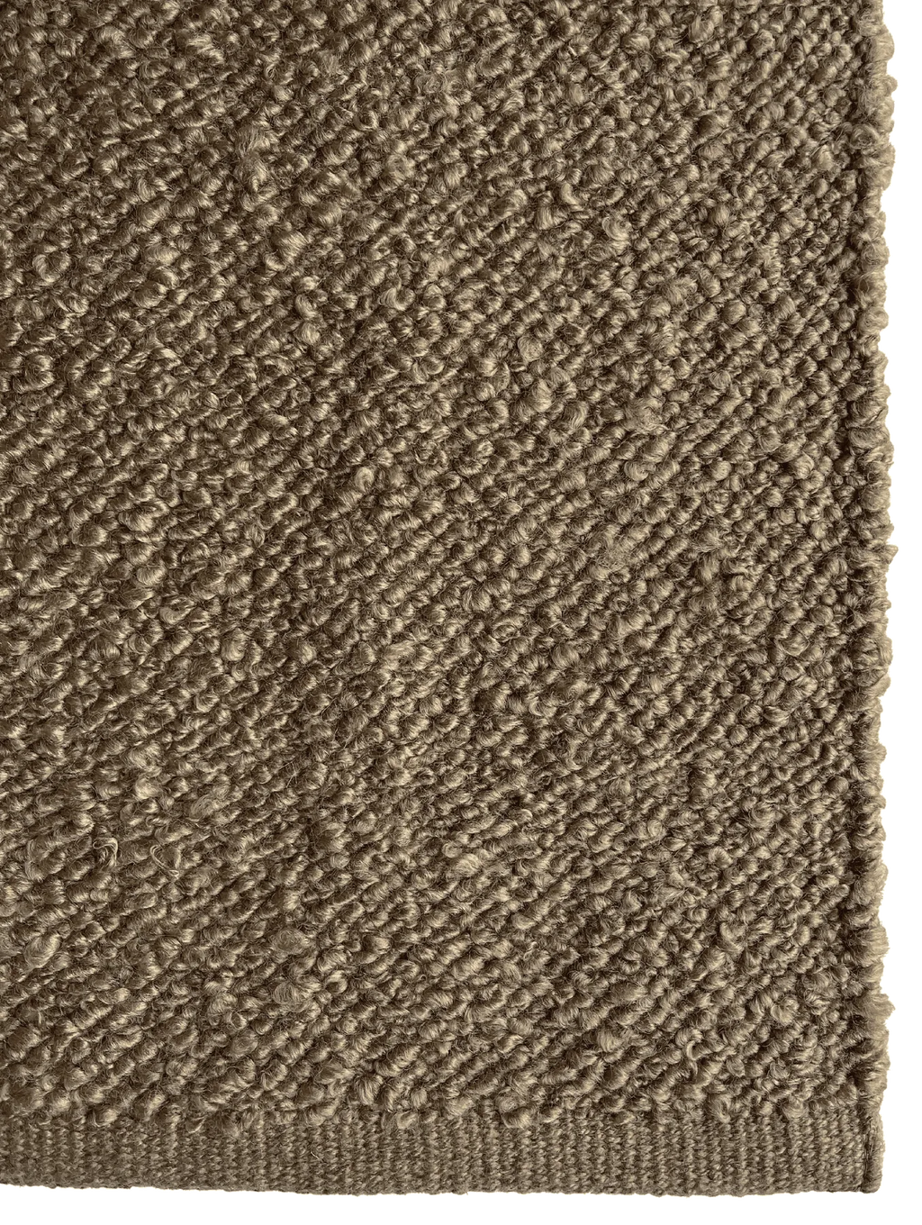 Close up of the Tribe Home Finn boucle outdoor rug in silt brown colour