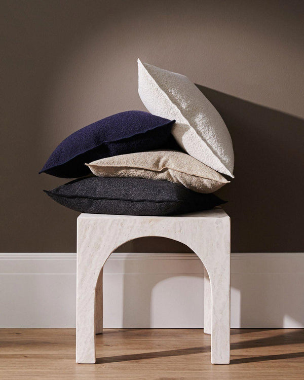 Beautiful stack of modern boucle cushions by Weave Home NZ