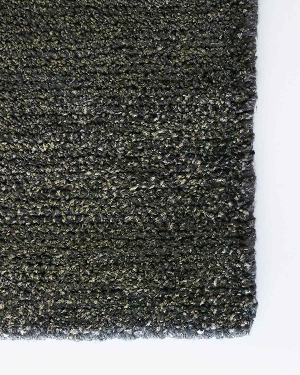 Close up view from above of Baya NZ Anchorage hallway runner in Gravel. Grey brown tones create interest in this dynamic rug.