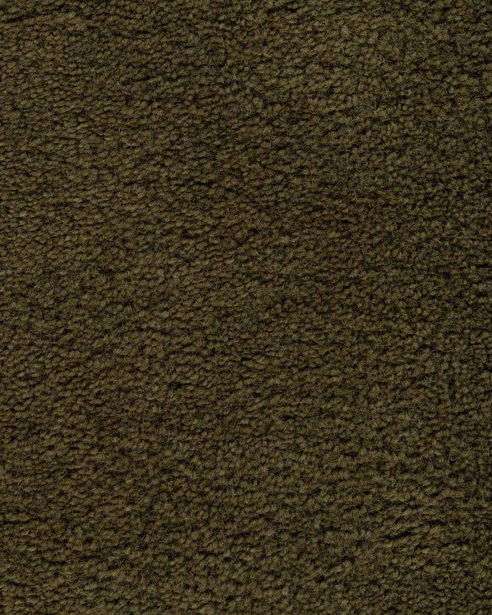 A close up of the weave of the Norfolk floor rug in Olive. The luxurious depth of the pile and sumptuous on-trend deep green colour make this rug a standout.