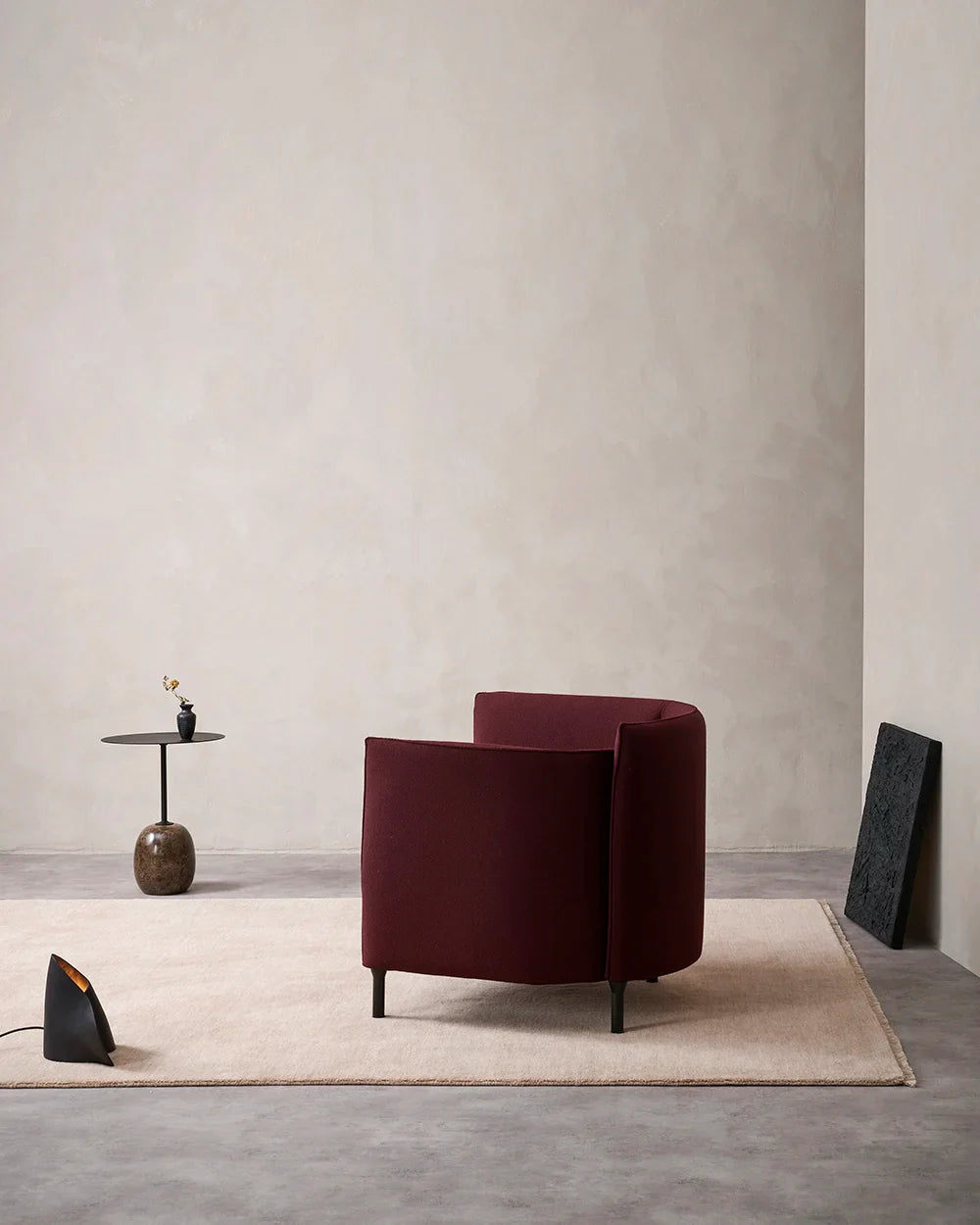 The Baya Sandringham wool rug in blush pink 'Cameo' colour, in a contemporary living space