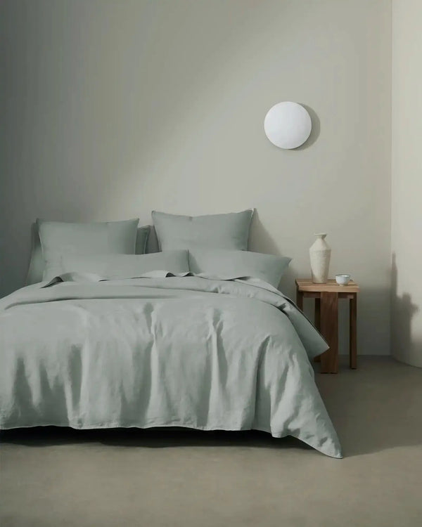 Weave Home Ravello premium French flax linen bedding displayed in a contemporary bedroom