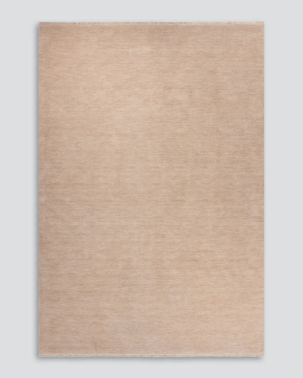 The Baya Sandringham wool rug in blush pink 'Cameo' colour, from above