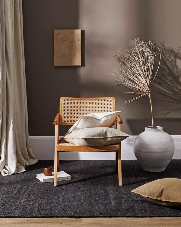 Stylish room interior featuring Weave Alberto boucle cushions