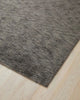 The Almonte wool blend  floor rug in colour coagrey with black flecked texturel 