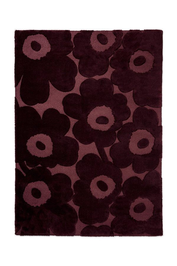 Marimekko Unikko floral patterned rug with deep burgundy flowers at varying pile heights