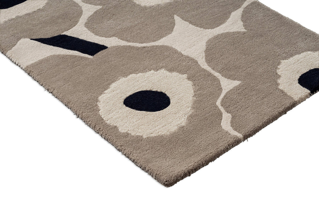 Close up of the Marimekko hallway runner rug in NZ wool with floral patterned on beige