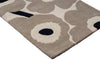 Close up of the Marimekko hallway runner rug in NZ wool with floral patterned on beige
