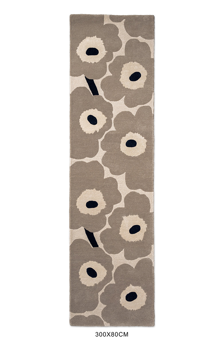 Marimekko hallway runner rug in NZ wool with floral patterned on a beige background