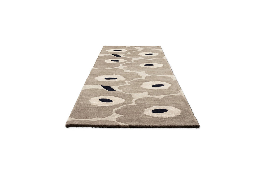 Perspective view of the Marimekko hallway runner rug in NZ wool with floral patterned on a beige background