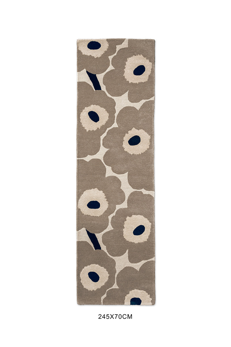 Marimekko hallway runner rug in NZ wool with floral patterned on a beige background