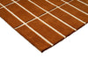 Corner view of a Marimekko NZ wool rust grid patterned rug
