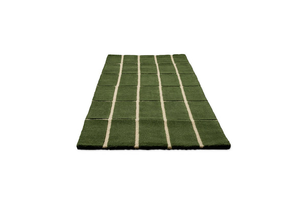 Perspective view of a green geometric Marimekko NZ wool runner rug 