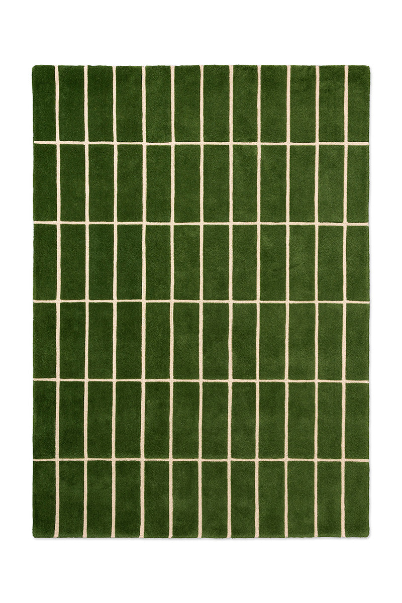 Full view of a green geometric Marimekko NZ wool rug 
