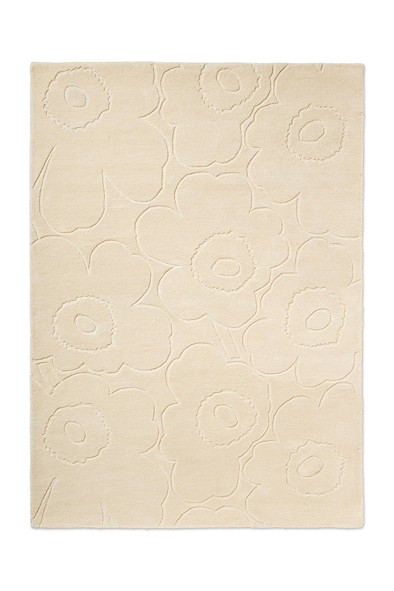 A creamy white Marimekko NZ wool rug with a subtle floral unikko graphic