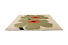 Marimekko Rug with green and orange floral design on a beige background