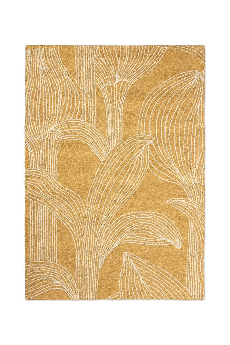 Marimekko Mustard Rug with leaf pattern on a white background