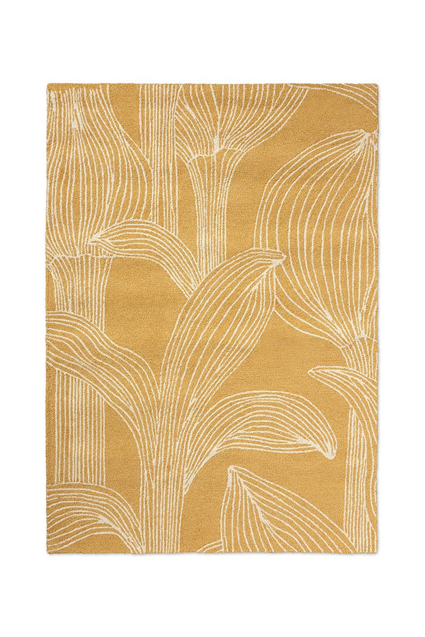 Marimekko Mustard Rug with leaf pattern on a white background
