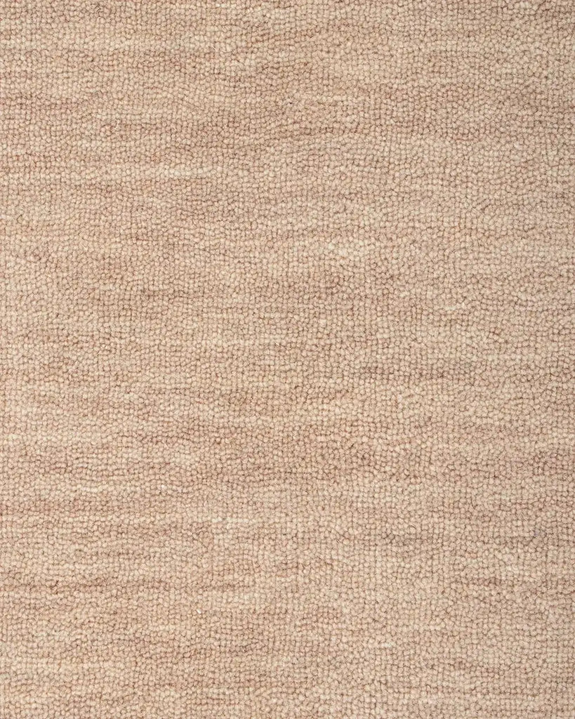 Close up of Corner of the Baya Sandringham wool rug in blush pink 'Cameo' colour