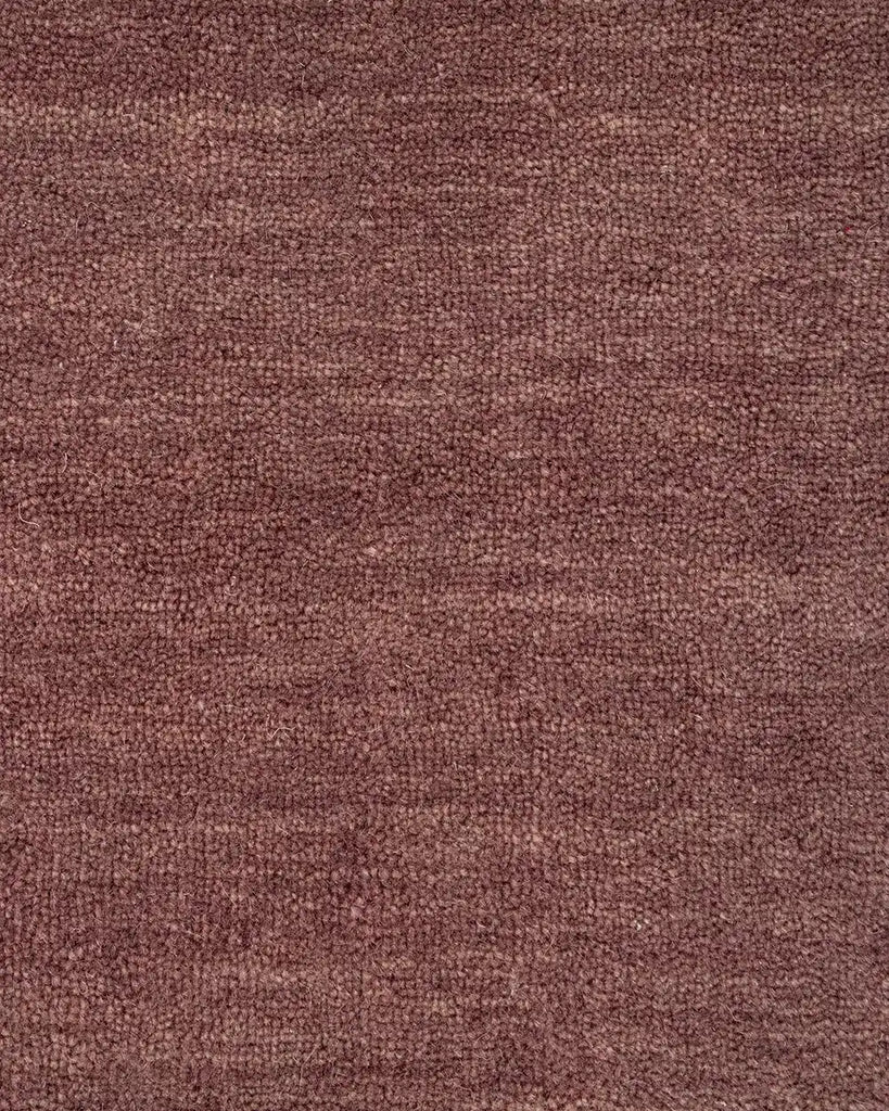 Close up of the Baya Sandringham wool floor rug, in colour 'Merlot' red