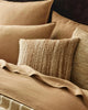 Textural, woven cushions in warm brown tones, by Weave Home nz 