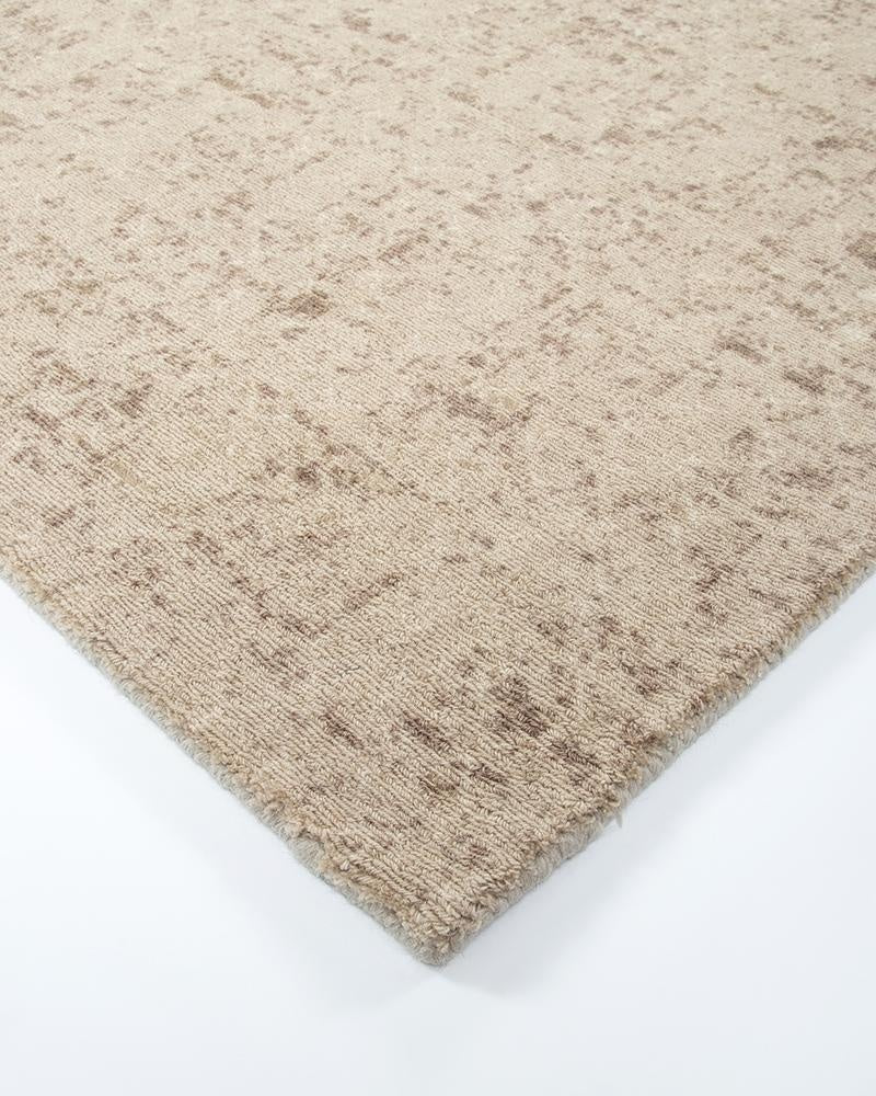 The Baya 'Cadence Camel' pure wool floor rug in brown and beige wool