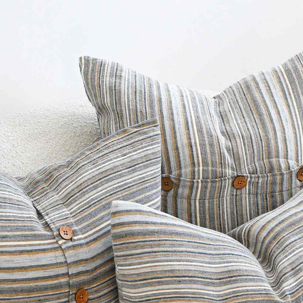 A collection of the three sizes of cushion in Coast, by Eadie. 