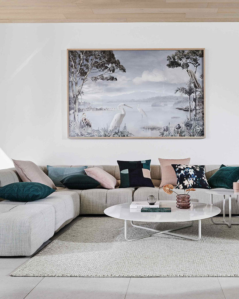 Styled living room interior featuring a couch and sophisticated Weave cushions