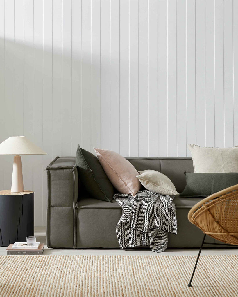 Styled living room interior featuring Weave NZ linen cushions and Onyx cotton throw