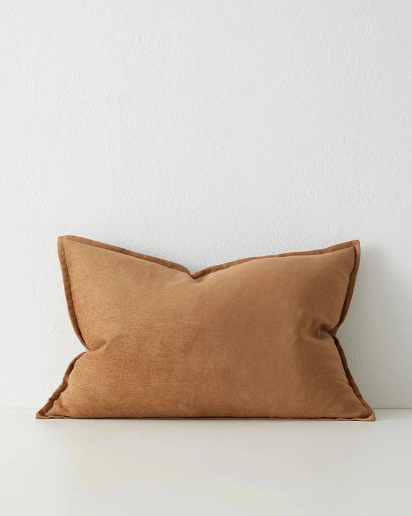 An ochre brown lumbar cushion with flange detail, in a linen chenille blend, by Weave nz