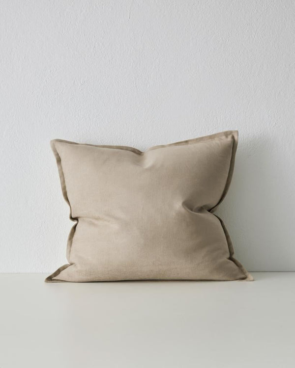 The Weave Home neutral Fiore cushion in colour 'Ecru' with flange edge