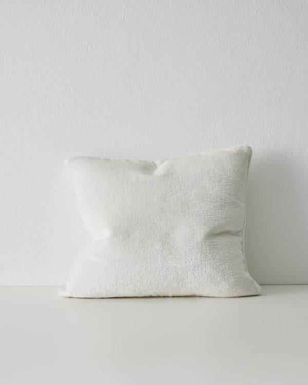 A luxurious clean white chenille cushion with piping - the Tempo Pearl by Weave