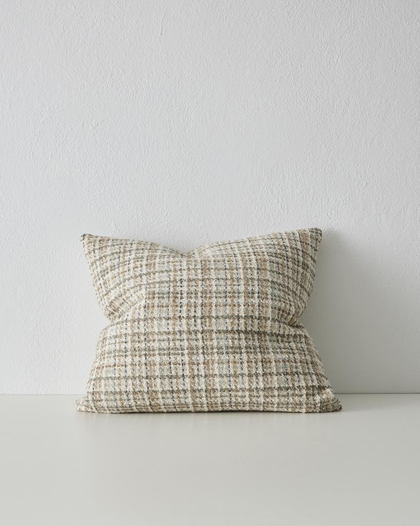 A woven cushion in creamy white, taupe and warm earthy tones - the Tripoli Fog by Weave Home nz.