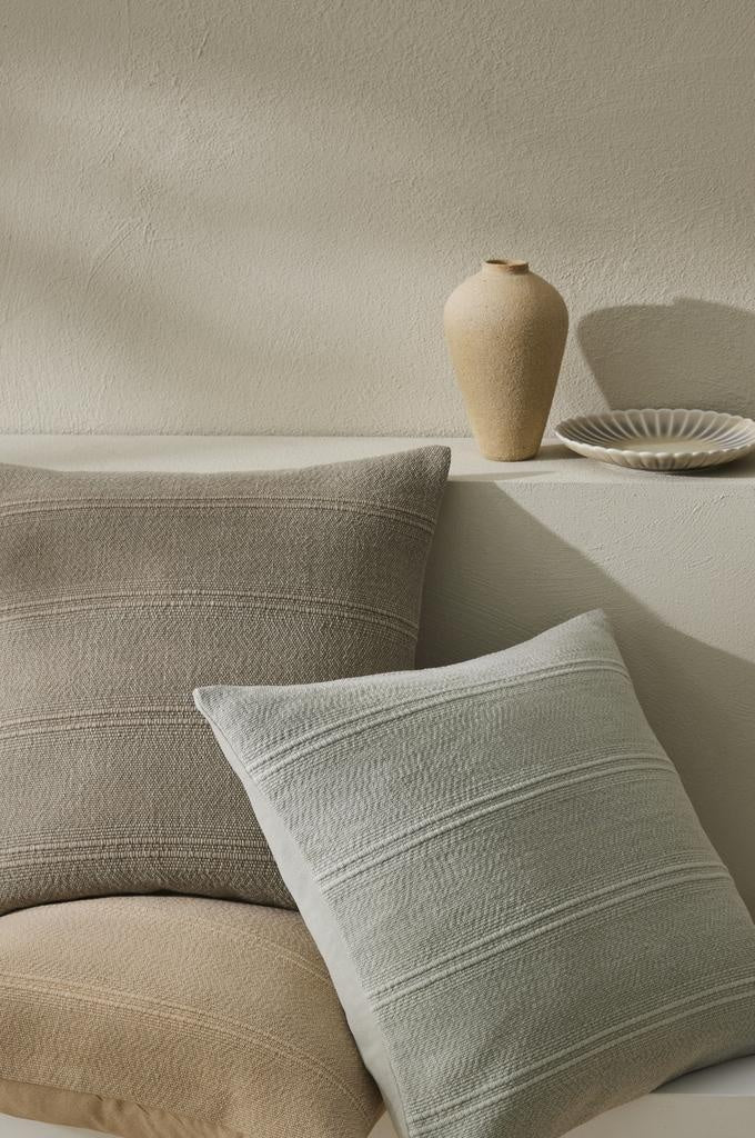 Three colourways in the Weave Home 'Palma' cushion range