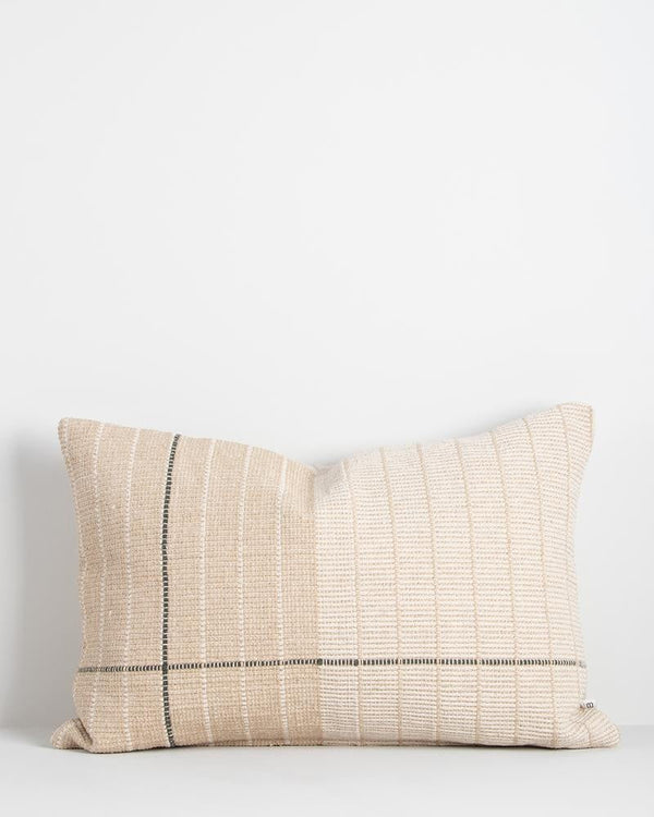 A stylish beige and off-white lumbar cushion with linear detail, inspired by Japanese design, the Takumi is designed by Baya NZ.