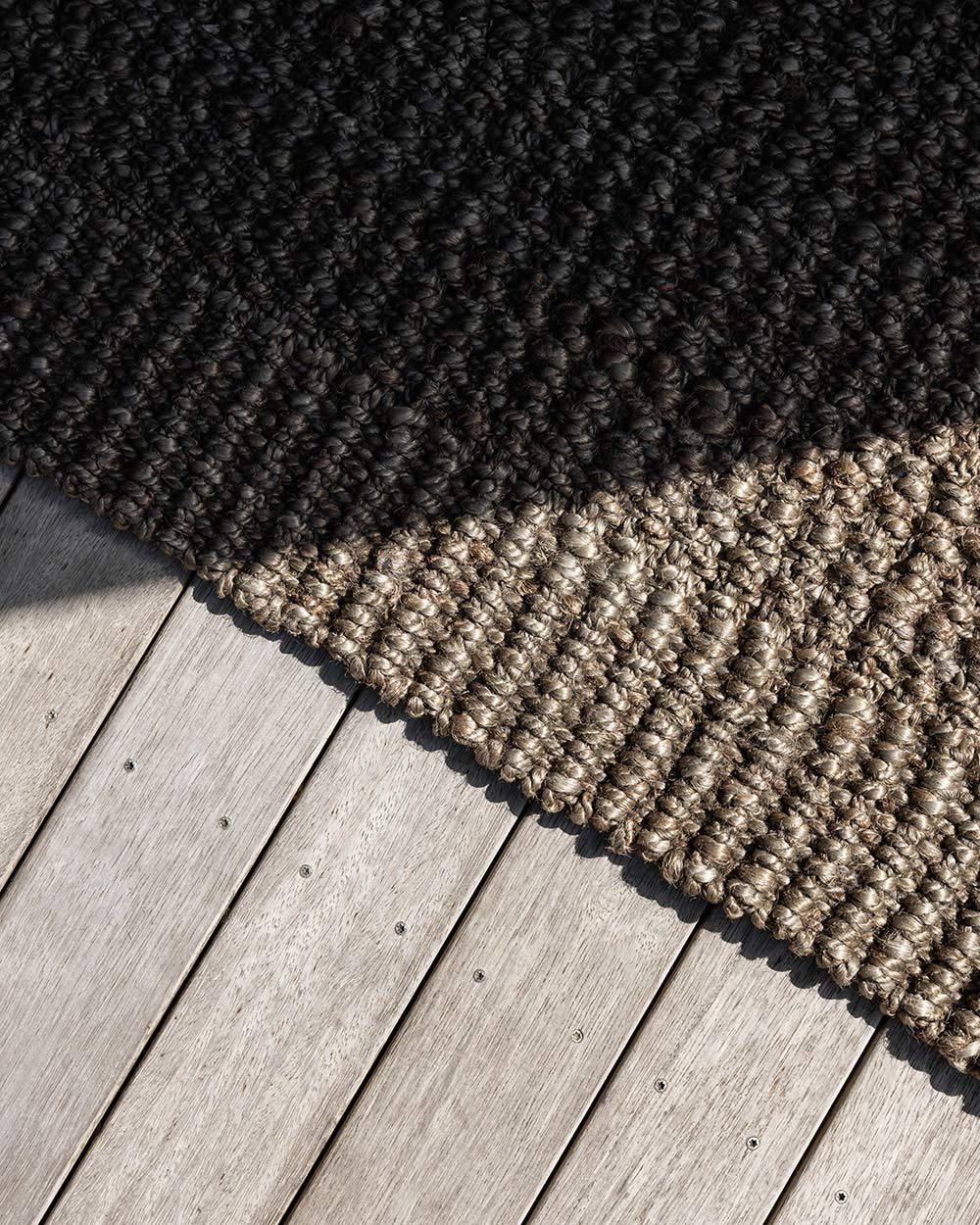The edge of the Broome entrance mat by Baya, showing the differing textures of the dark mat.