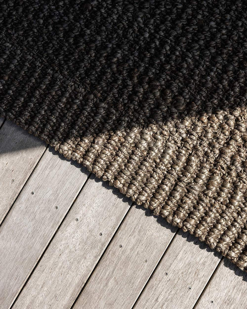 The edge of the Broome entrance mat by Baya, showing the differing textures of the dark mat.