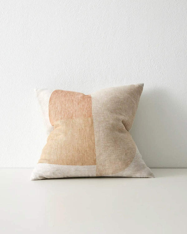 A geometric cushion in earthy tones by Weave Home AU