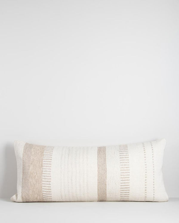 An extra-long lumbar cushion in white and beige - the Bettie by Baya.