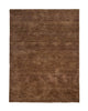 A brown, chocolate coloured wool rug with a thick, plush pile - the Valencia Toffee by Weave Home - seen in full from abive