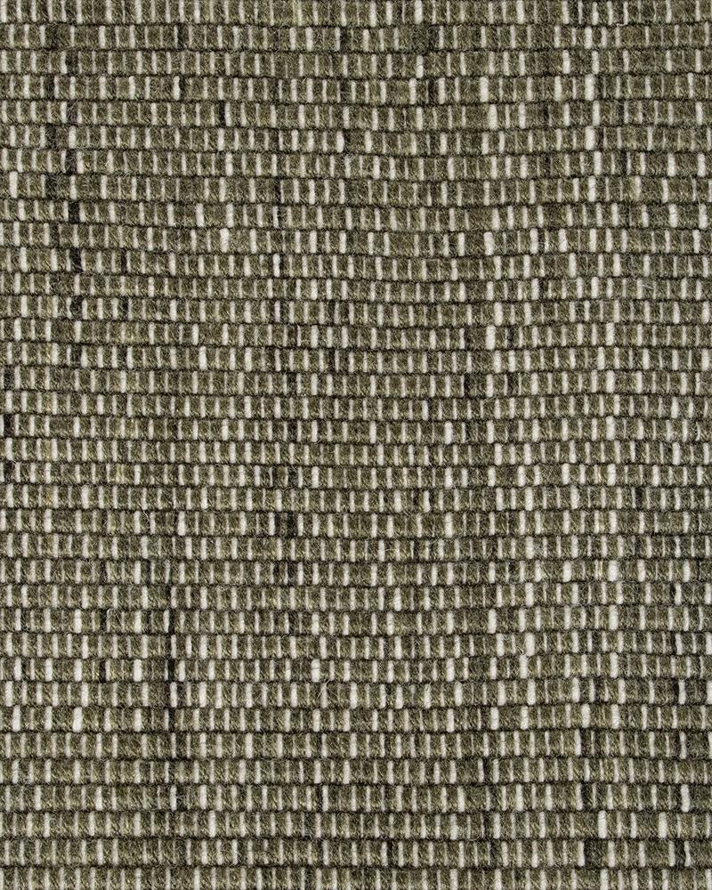 Extreme close up of the Lonsdale olive green outdoor rug by Baya, showing its textural weave