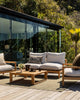 The Lonsdale, green outdoor rug by Baya, seen in a modern home outdoor seating area