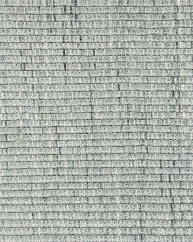 Extreme close up of the Baya Londsdale Eucalyptus green outdoor rug, allowing the textural weave to be clearly seen